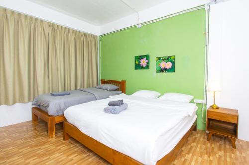 Thung Maha Mek Hostel | Tom Guest House ทอมส์ เกสต์เฮ้าส์