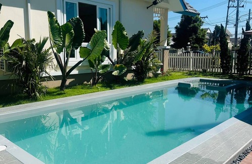 San Sai House | Luxurious 3-Bedroom Pool Villa in Nong Han, Thailand