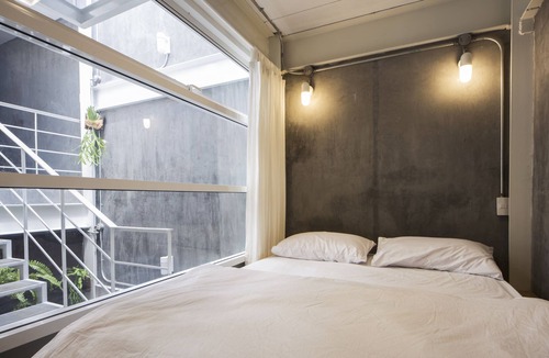 Khlong Toei Nuea Hostel | On the bed Hostel