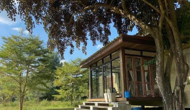 House surrounded by nature near Tao Garden