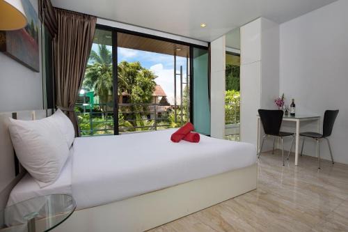 Lively Stay at Vibrant Kata, 4BR Pool Villa B2 near Beach - UTK2 in Kata Beach