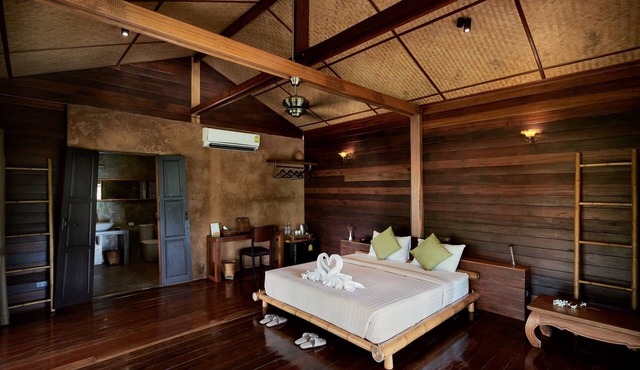 Luxury loft in stilted wooden longhouse