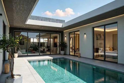 Modern Luxury 4BR Pool Villa by the Sea E1