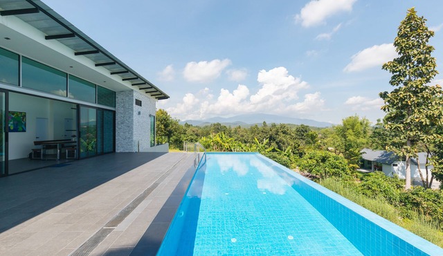 Swimming pool along the terrace, panoramic view surrounded by nature