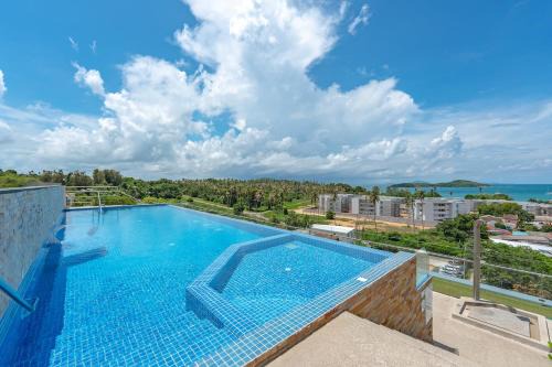 Rawai Apartment | C189 Beachside Luxury in Rawai Sea View and Gym