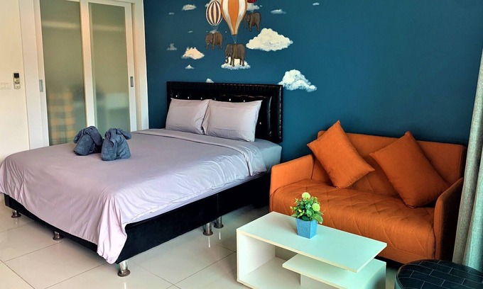 Wichit Apartment | Cozy Pool view Studio Suite | Kitchen | Balcony