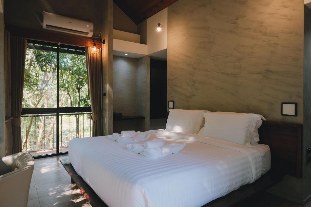Photo of Bedroom in Ban Thalane