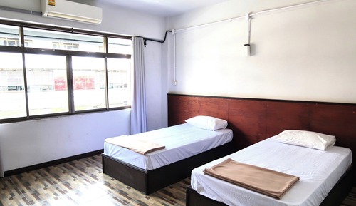 Twin Bed Room with Shared Bathroom