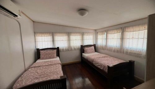 Single Bed in Female Dormitory Room