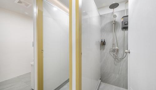 Standard room King Bed Shared Bathroom