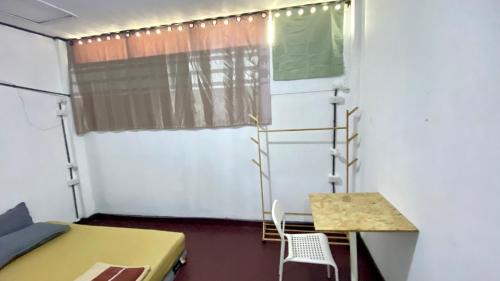 Single Bed in Dormitory Room
