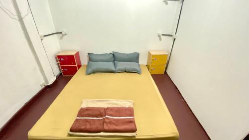 Single Bed in Dormitory Room
