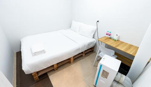 Standard Double Room with Shared Bathroom