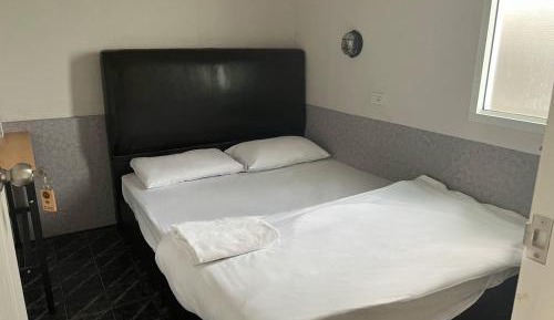 Queen Room with Shared Bathroom