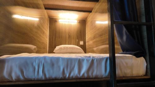 Single Bed in Dormitory Room