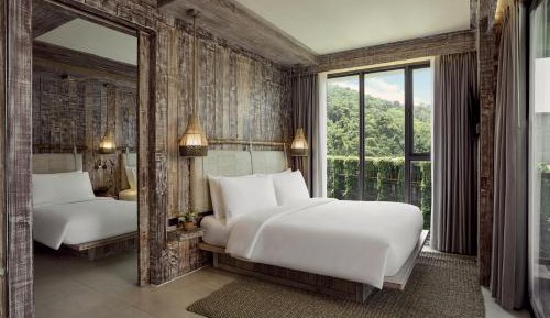 Two-Bedroom Corner Suite with King and Single Bed