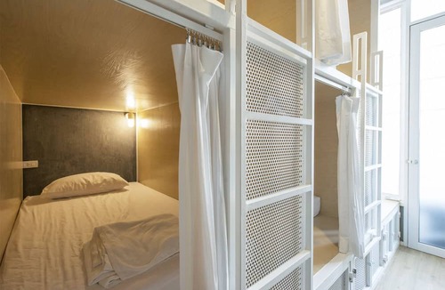 Khlong Toei Nuea Hostel | On the bed Hostel