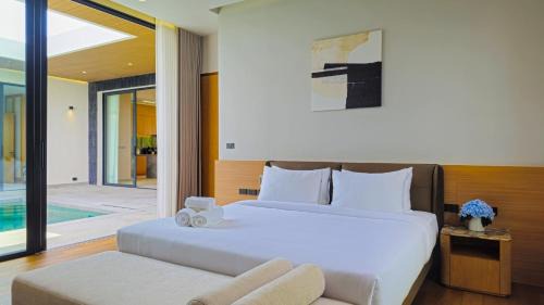 Chalong Villa | Modern Luxury 4BR Pool Villa by the Sea D1