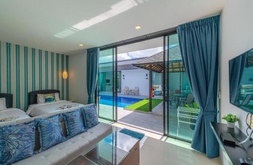 Si Sunthon Villa | Lespalm Resort by Vacayandco