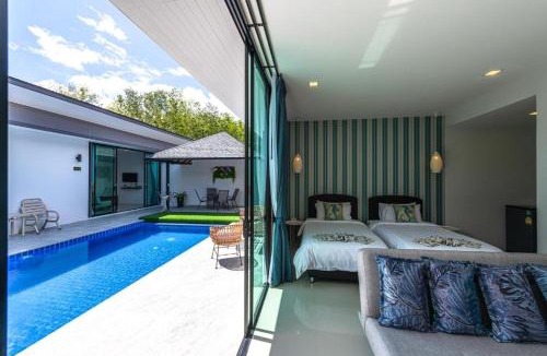Si Sunthon Villa | Lespalm Resort by Vacayandco