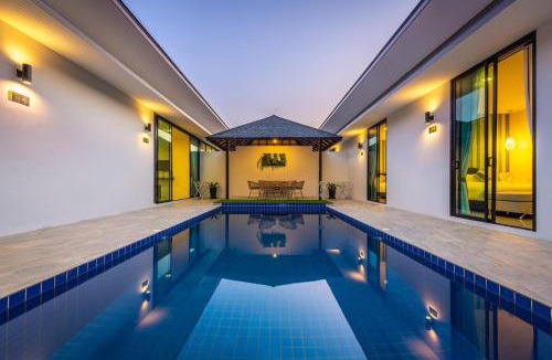 Si Sunthon Villa | Lespalm Resort by Vacayandco