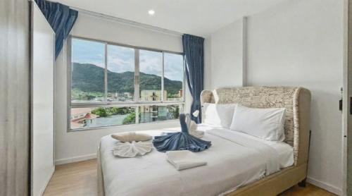 Kathu Apartment | Dcondo Kathu - Top Floor 1 Bdr Condo with shared Pool