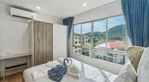 Kathu Apartment | Dcondo Kathu - Top Floor 1 Bdr Condo with shared Pool