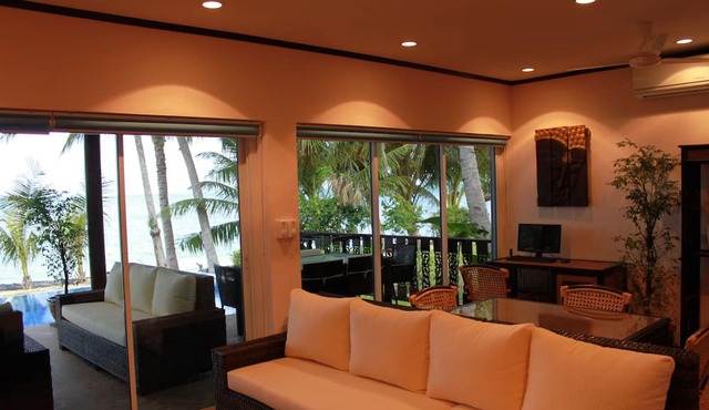 Superb Beachfront Villa with private Pool & Jacuzzi in tropical garden.