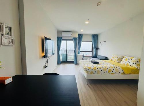 Boutique apartment in Bangkok with a separate living room, rooftop garden, free parking, and high-speed Wi-Fi in Bangkok