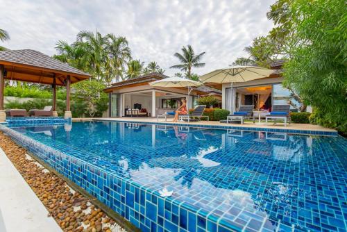 Dhevatara Residence Beachfront Villas in Plai Laem